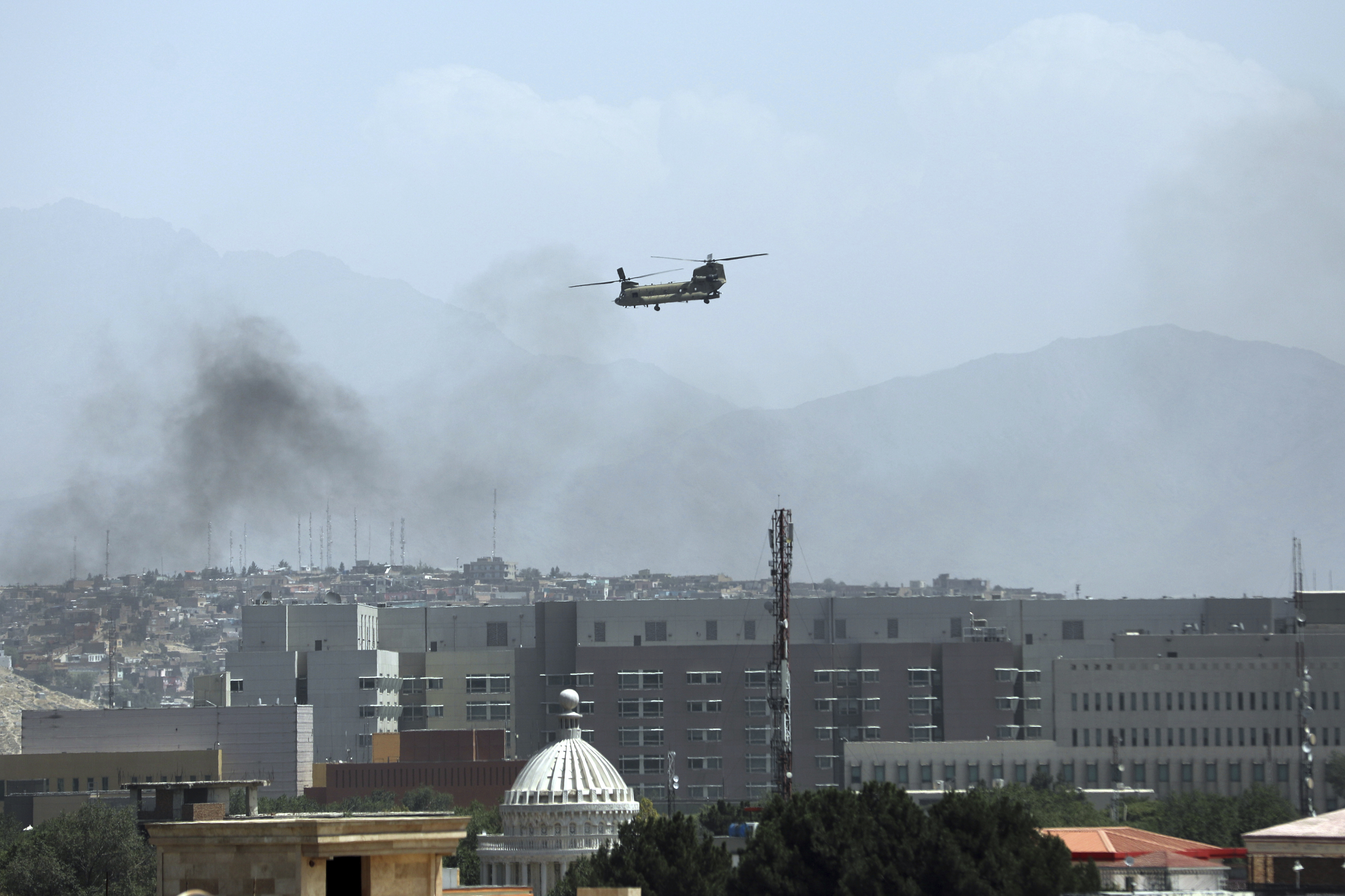 "Game over:" Westerners rush to leave Kabul, rescue Afghans