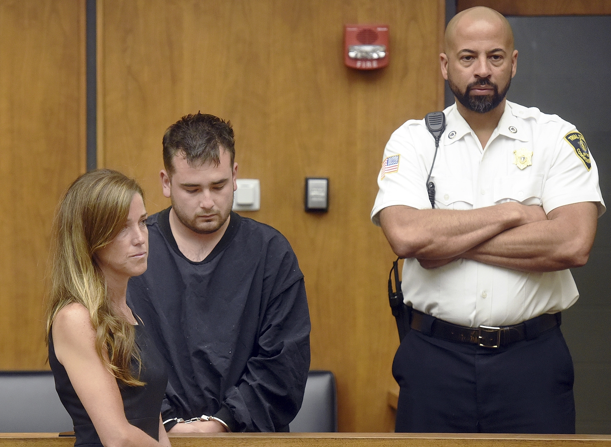 Sweaty fashion crowd lured outside for Kanye West show