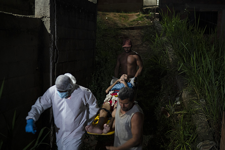 The Latest: India reports record surge, Modi gets 2nd shot