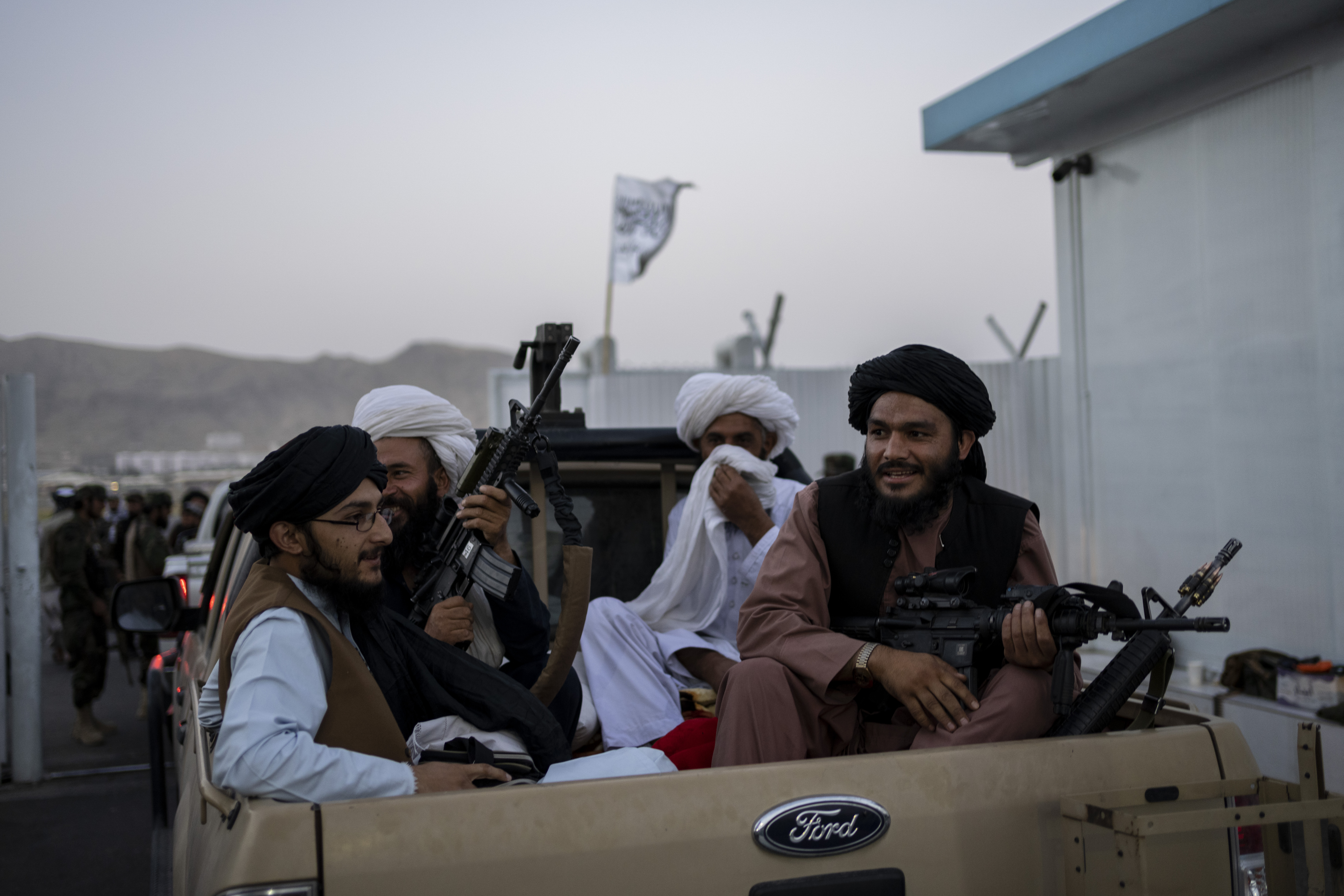 The Latest: Pakistan says world wants to engage Taliban