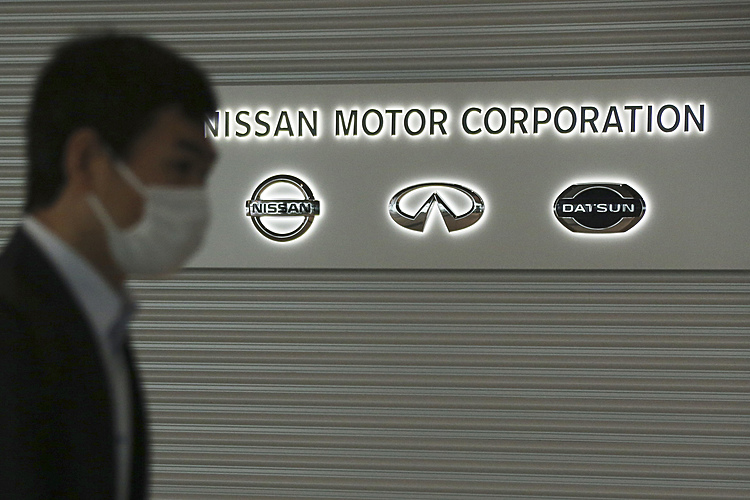 Nissan officials face angry shareholders on red ink, scandal