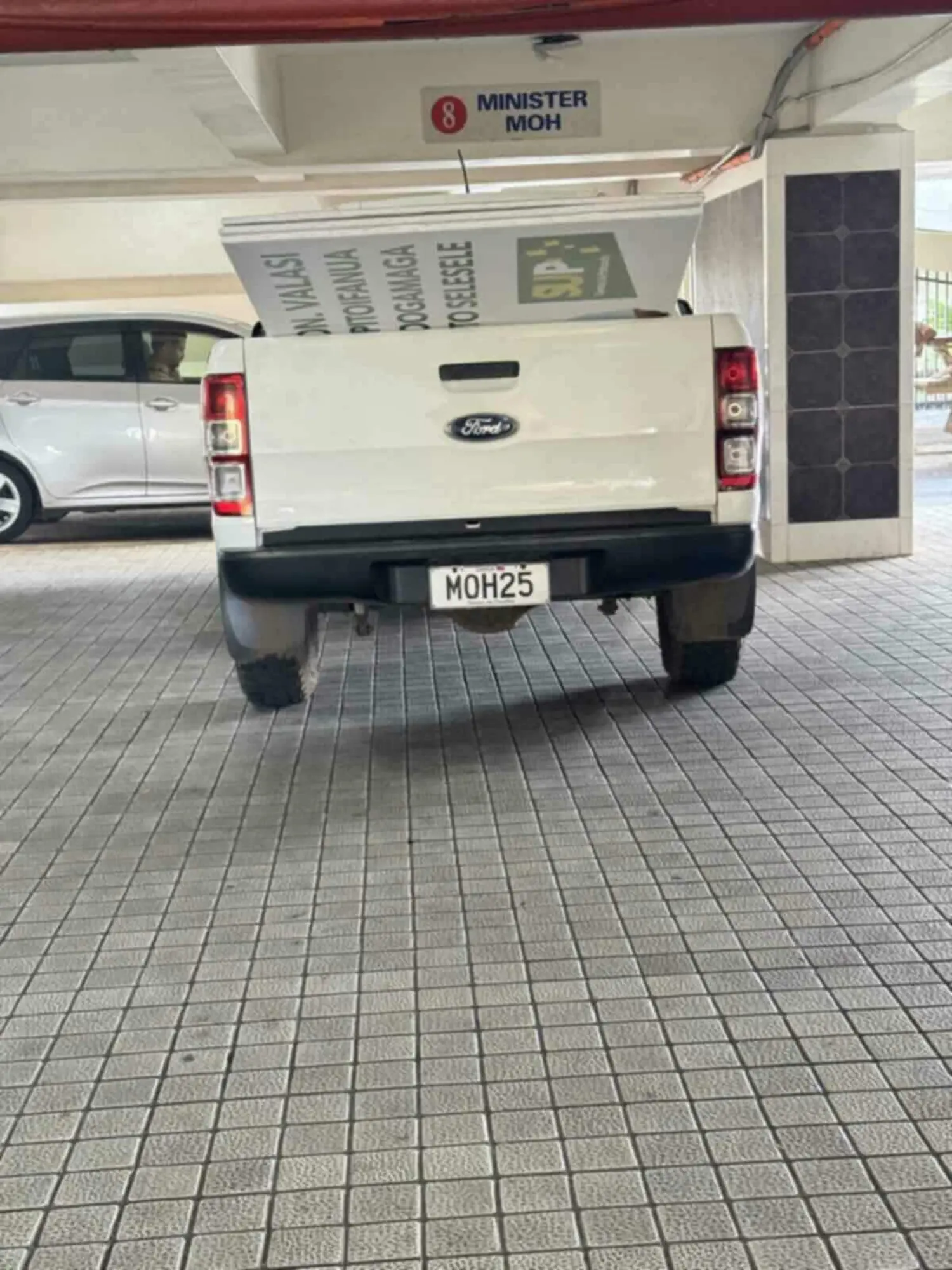 Government courier: MOH vehicle carrying SUP banners