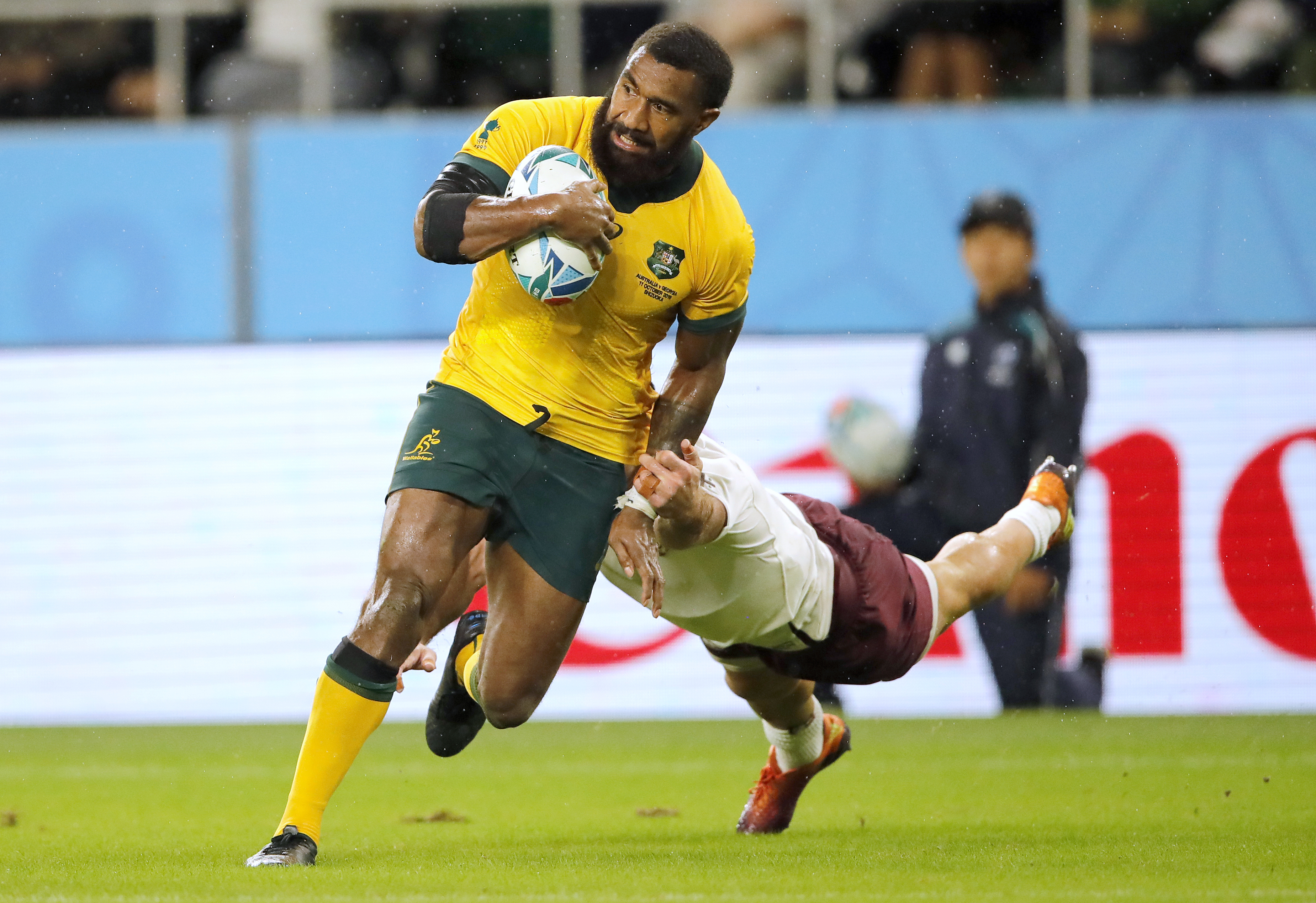 The Latest: Australia beats Georgia 27-8 in the wet