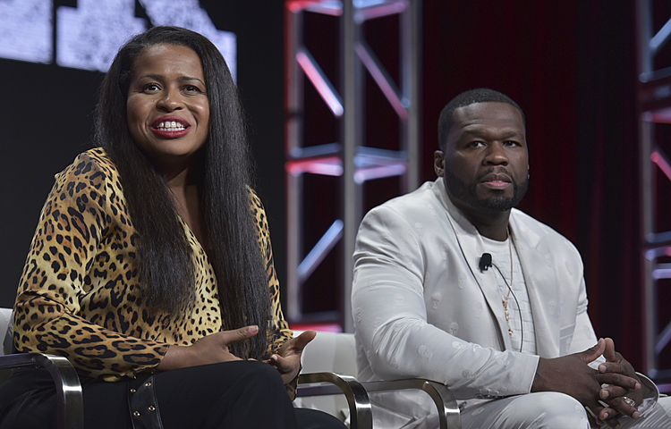 A beaming 50 Cent,  tough questions part of TV critics event