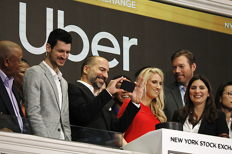 Uber's hyped-up IPO hits a few potholes on its first day