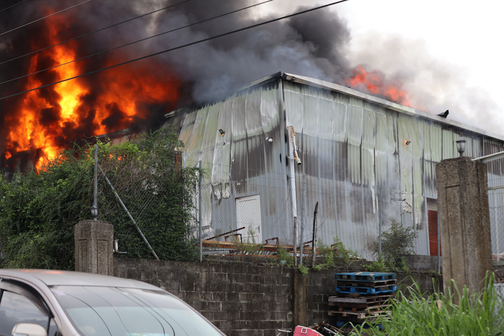 Firefighters battle to save burning Digicel Storage Warehouse