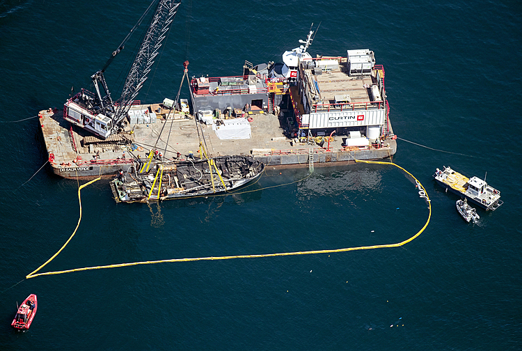 Crew was asleep when fatal boat fire ignited, officials say