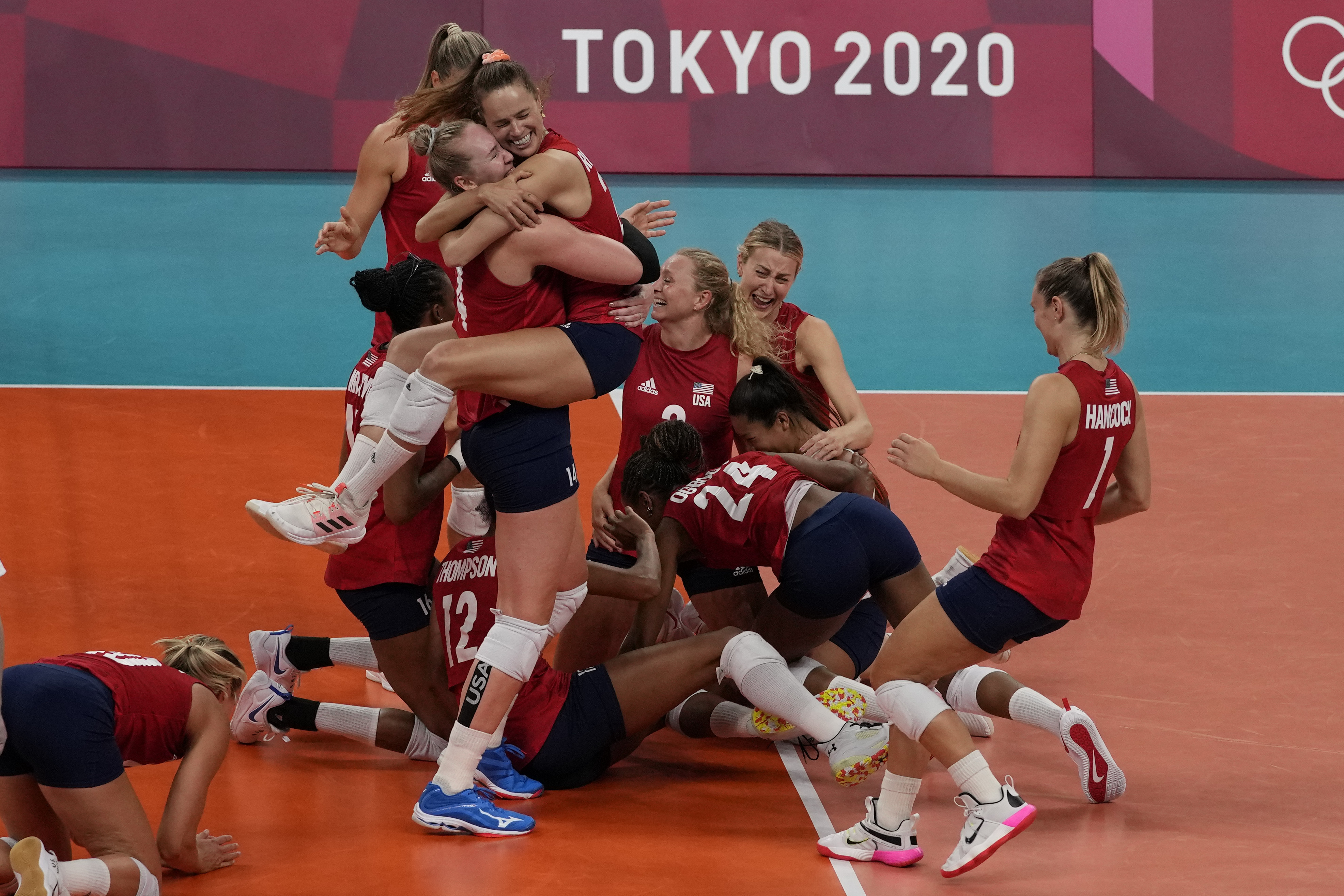 Olympic Latest: US women win 1st gold in volleyball