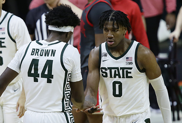 The Latest: Big Ten to allow fans for basketball tournaments