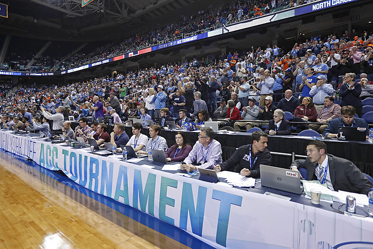 The Latest: ACC puts sports on pause; NCAA tourney in doubt