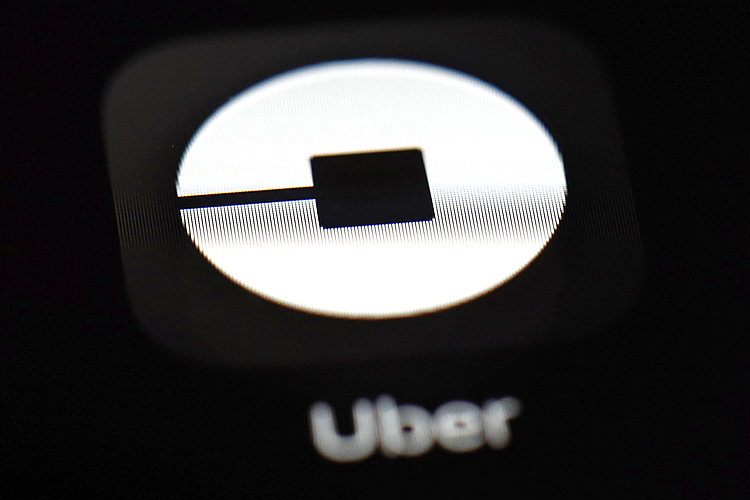 Uber shifts into lower gear, prices IPO at $45