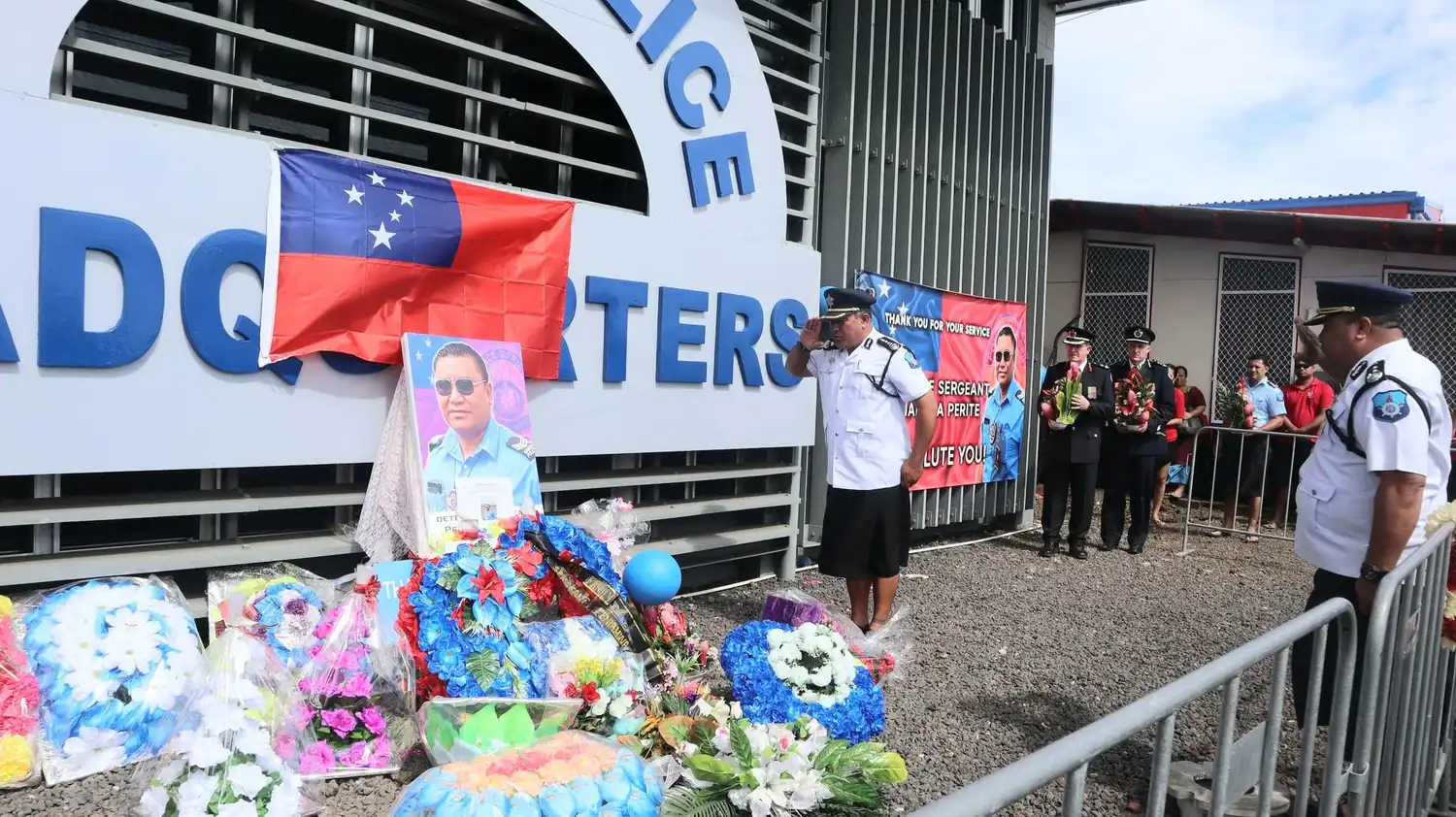 Tributes flow for fallen officer