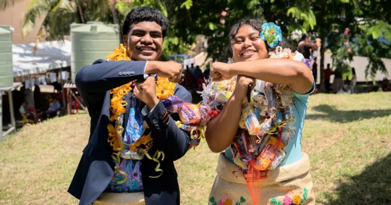 Brother and sister graduate together